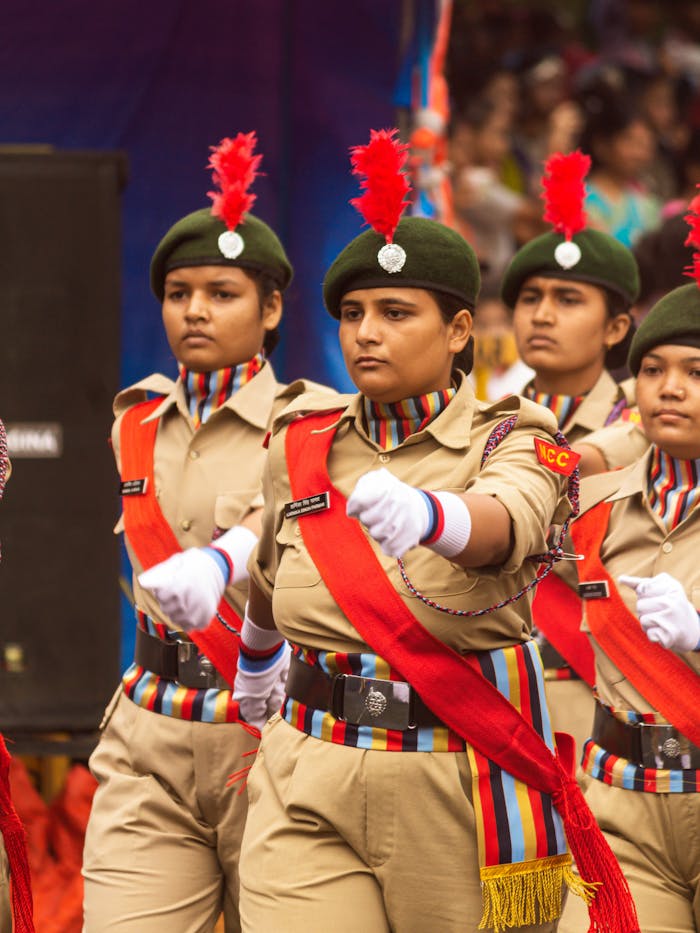 Group of women marching in NCC uniforms during a parade in Sagar, India.